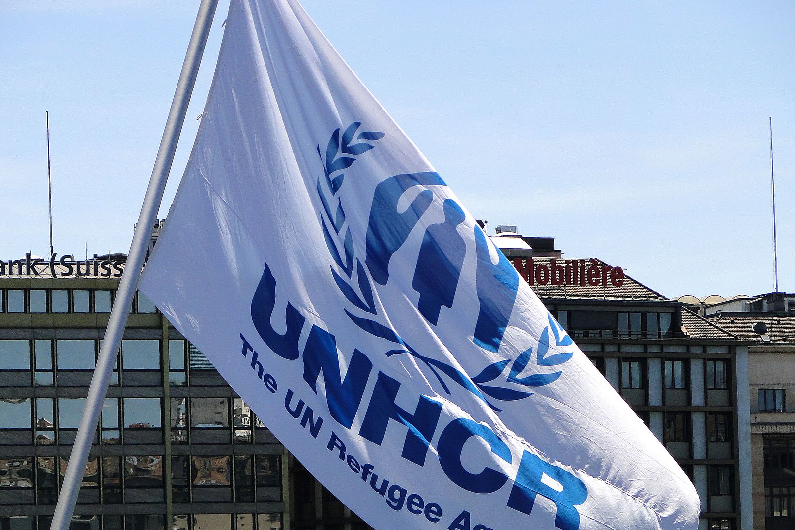 By Adam Jones, Ph.D. “Banner of UN High Commissioner for Refugees - Geneva – Switzerland” https://creativecommons.org/licenses/by-sa/3.0/deed.en