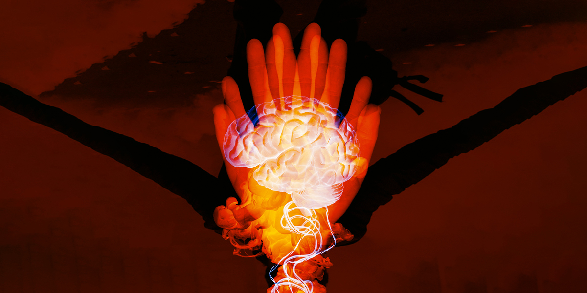 brain superimposed on hands
