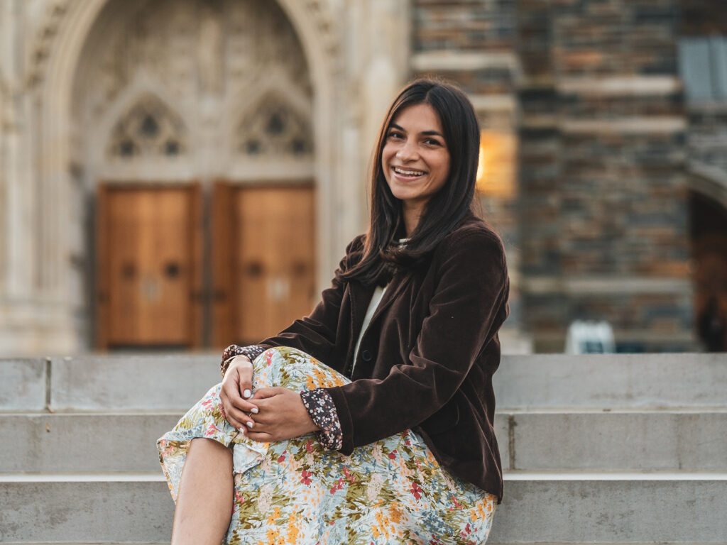 Kendra Rentz seated on Duke Chapel steps